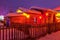 The farmyards and wooden fence at night