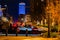 Farnam Street Omaha at night with WoodmenLife building in the distance.