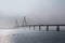 Faro bridge in foggy weather, the highway bridge over the Storstroem in denmark connects the islands and is a part of the