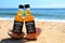 Faro, Portugal - 12/10/2018: Two little bottles Jack Daniels whiskey in the ocean shells stand on the sand. Alcoholic party in a