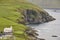 Faroe islands cliffs fjord coastline. Vidareidi village in Vidoy