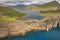 Faroe islands dramatic coastline in Vagar. Leitisvatn lake