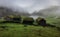 Faroe islands - Grass roof houses in the small village Saksun, Dark clouds atmosphere