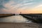 Farolim de Felgueiras, Pier and lighthouse at Porto, Portugal During sunset