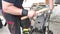 Farrier blacksmith making horse shoe with hammer and anvil.