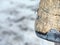 Farrier trimming steel nails and ceratin on horse hoof