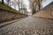 fascinating detail of a cobblestone pathway leading to a castle