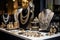 fashion accessories display with mix of metallic and crystal necklaces, bracelets, and earrings