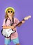 Fashion American country boy playing music. Portrait of cute child boy at guitar practice. Funny rock child with guitar.