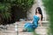 Fashion attractive woman with blue long dress