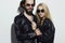 Fashion beautiful couple together.Hipster boy and girl. Bearded young man and blonde in sunglasses