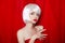 Fashion Beauty Blond Portrait with White Short Hair. Make-up. Be