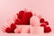 Fashion bright romance pastel pink scene mockup with set of two cylinder podiums, red, pink origami paper hearts, closeup. Love.