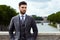 Fashion businessman looking future on river in Rome