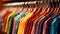 Fashion clothes on clothing rack - bright colorful closet.