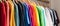 Fashion clothes on clothing rack colorful closet