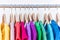 Fashion clothes on clothing rack colorful closet