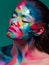 Fashion and creative makeup, young beautiful woman abstract face art.