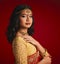 Fashion, culture and portrait of Indian woman with beauty in traditional clothes, jewellery and sari. Religion, Hindu