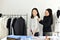 Fashion designer measures customer body size with measuring tape , Dressmaker design customized tailor pattern.