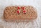 Fashion earrings style red jewels with diamonds on golden purse