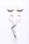 Fashion fake false eyelash with curler on white background