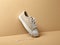 Fashion Forward: Trendy Sneaker on Beige Background with Space for Text