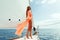 Fashion girl yachting in sea with blue sky sunlight