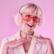 Fashion, glasses and woman with smile on pink background for beauty, vaporwave style and cosmetics. Creative aesthetic