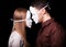 Fashion Happy Couple in Love holding with mask face