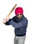 Fashion hipster cool man in sunglasses and colorful clothes brandishing a baseball bat