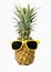 Fashion hipster pineapple, Bright summer color, Tropical fruit with sunglasses, Creative art concept, Minimal style