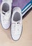 Fashion Ideas and Concepts. Pair of White Fasionable Sneakers Cl