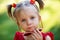 Fashion kids girl in sunglasses. adorable toddler child in mirror sunglasses, dressed in a red dress.