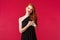 Fashion, luxury and beauty concept. Elegant good-looking redhead woman in black dress, with red lipstick and luxurious