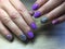 fashion manicure lilac and blue color and leopard