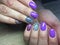 fashion manicure lilac and blue color and leopard