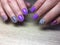 fashion manicure lilac and blue color and leopard