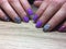 fashion manicure lilac and blue color and leopard