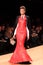 Fashion model catwalk red leather dress