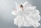 Fashion Model in Creative Pure White Dress as Cloud. Woman in Long Silk Gown with Chiffon Fabric flying on Wind over Light Gray