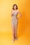 Fashion Model Gold Dress, Woman in Beauty Golden Gown with Champagne, Lady in Long Clothes