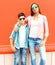 Fashion mother with son teenager in a sunglasses, checkered shirt