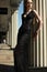 Fashion outdoors portrait of beautiful woman model in luxury black lacy dress