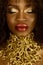 Fashion photo of beautiful elegant african american woman. Girl posing with closed eyes and jewelry, wearing fashionable gold neck