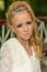 Fashion photo of a young girl in a beautiful white dress