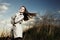 Fashion portrait of elegant woman in a raincoat