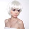 Fashion portrait with White Short Hair. Haircut. Hairstyle. Fringe. Professional Makeup. Make-up. Vogue Style Woman isolated on W