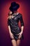 Fashion portrait woman,sequins dress black hat red