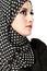 Fashion portrait of young beautiful muslim woman with black scar